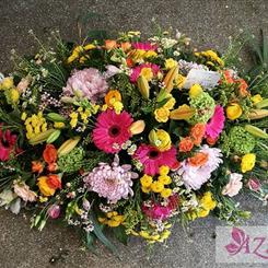 Rainbow Rhapsody Casket Spray S117