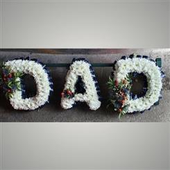 DAD letters with berries